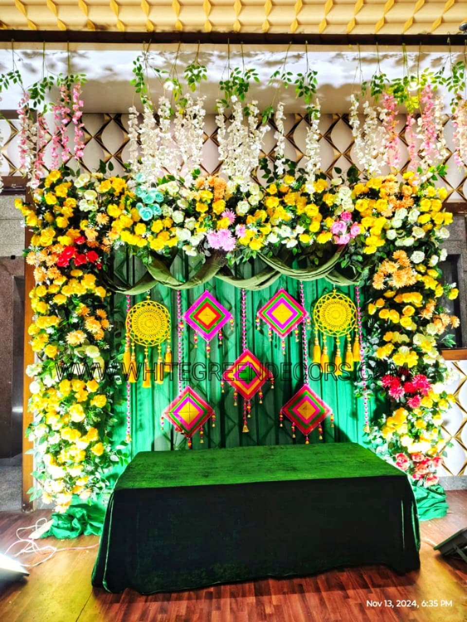Luxury Green Mehndi Decoration Setup with Floral Frame