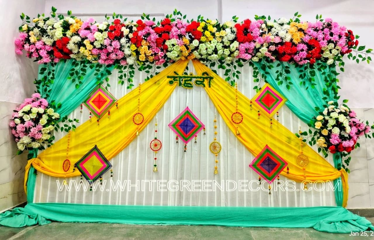 Elegant Mehndi Backdrop Decoration with Floral Arch Setup