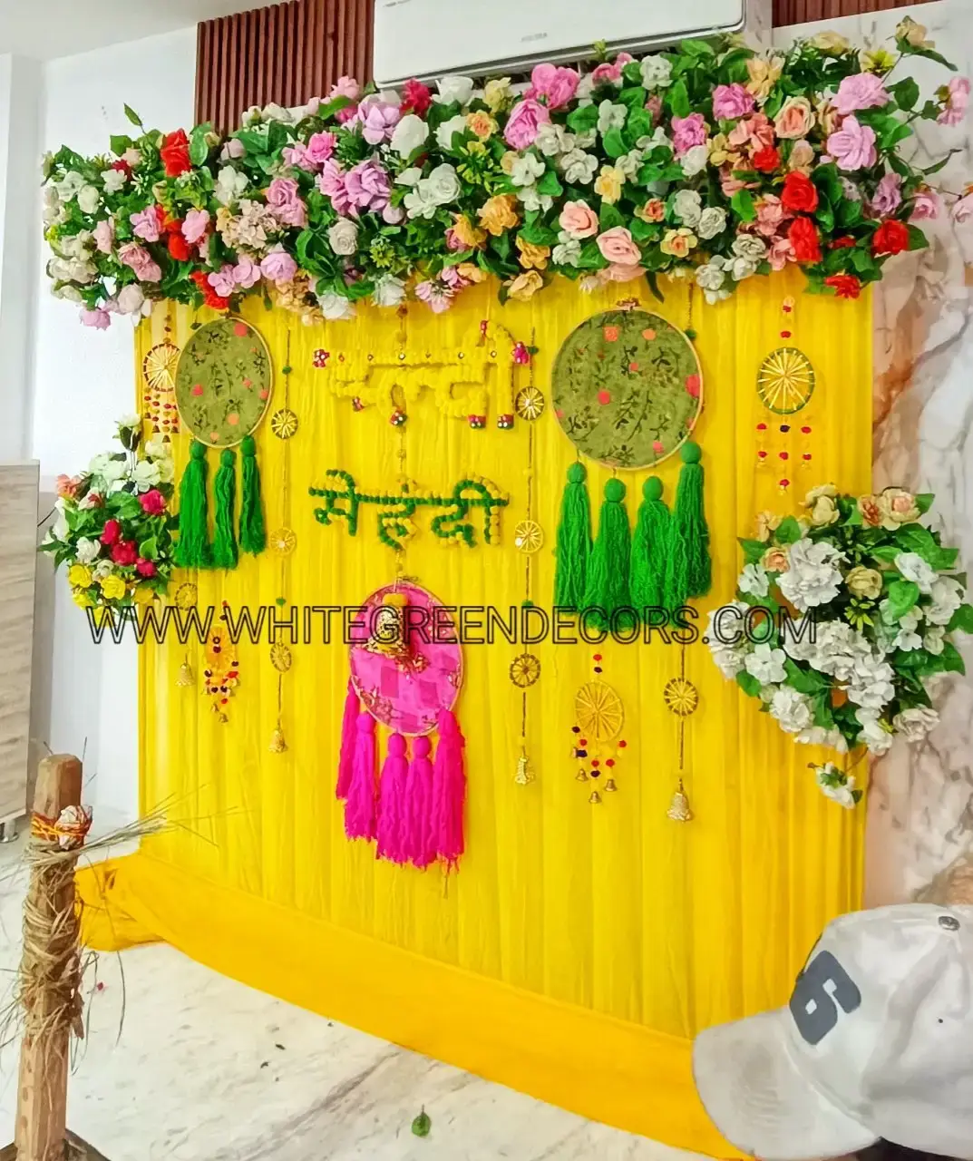 Elegant Yellow Mehndi Backdrop Decoration with Floral Top Border